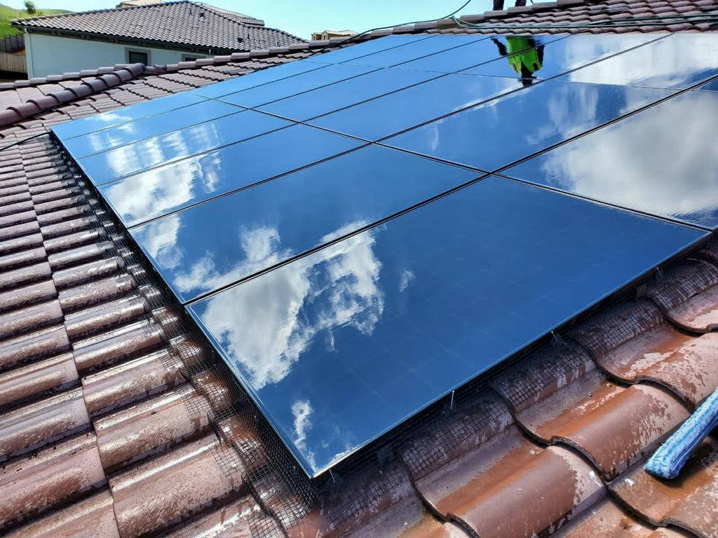 clean-solar-panels-curved-tile-roof